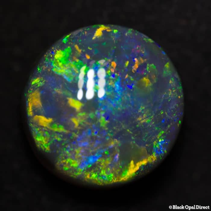 4.74 ct gem black opal 11mm round x6mm thick - Image 3