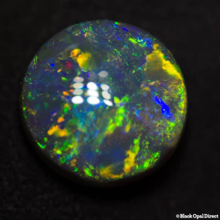 4.74 ct gem black opal 11mm round x6mm thick - Image 4