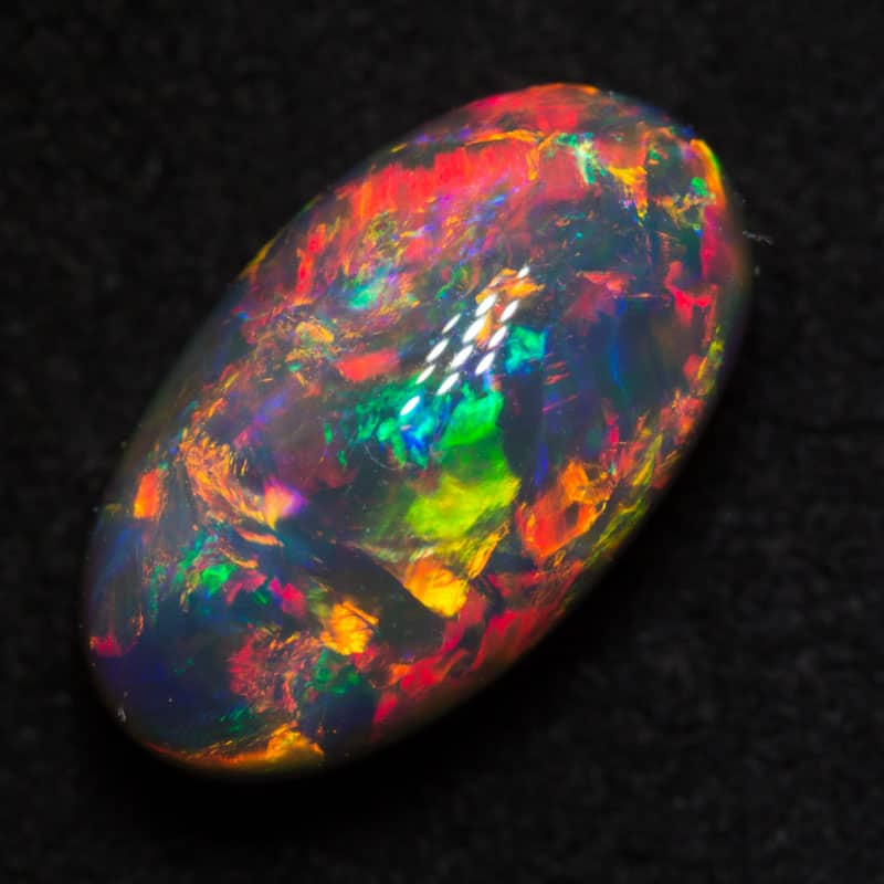 4.78 ct gem black opal 13.7x7.9x7.1mm - Image 2