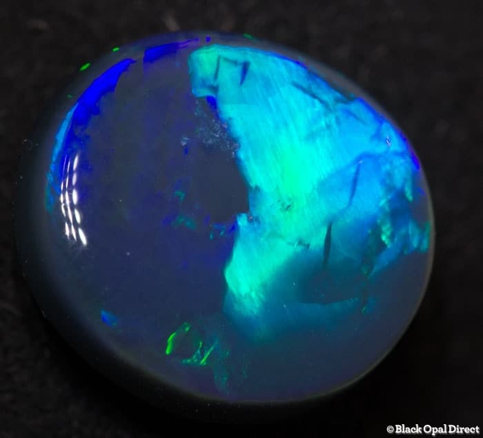 4.84 ct black opal with chinese writing 12.5x11.5x5mm Tim - Image 2