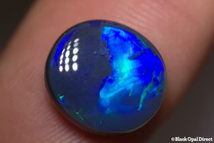 4.84 ct black opal with chinese writing 12.5x11.5x5mm Tim - Image 6