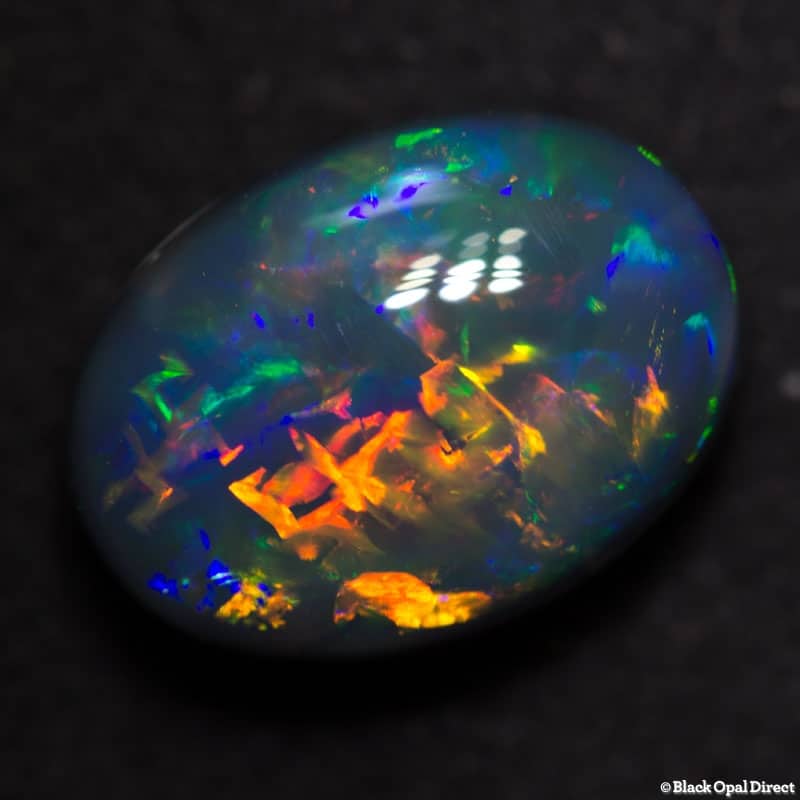 5.17 ct gem black collectors opal with Chinese Writing 13x9.5x6.5mm - Image 4