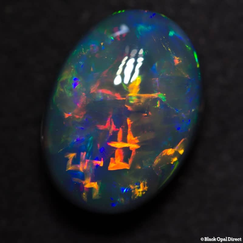 5.17 ct gem black collectors opal with Chinese Writing 13x9.5x6.5mm - Image 5