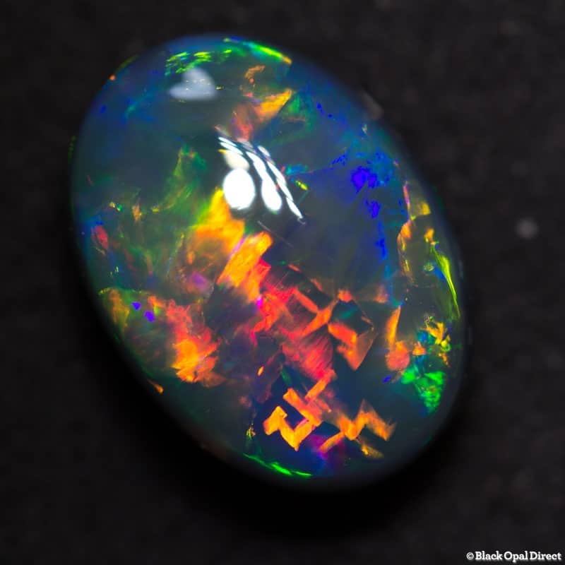 5.17 ct gem black collectors opal with Chinese Writing 13x9.5x6.5mm - Image 6