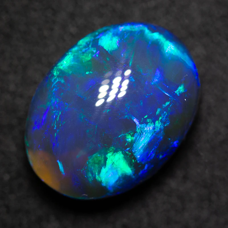 5.61 ct black opal 13.3x10.2x6.8mm - Image 2