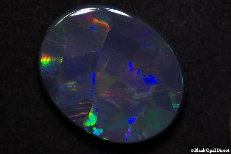 5.67 ct harlequin black opal 16x13x4mm - Image 2