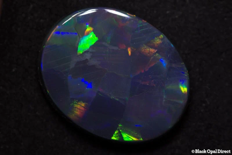 5.67 ct harlequin black opal 16x13x4mm - Image 4