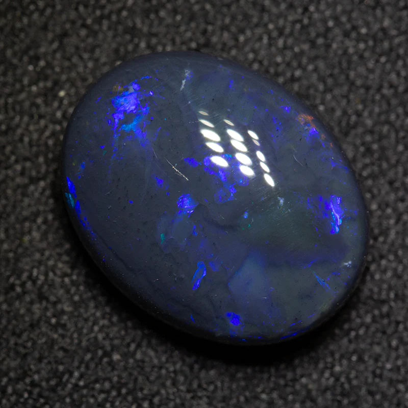 5.95 ct black opal 13.7x10.9x6.1mm - Image 3