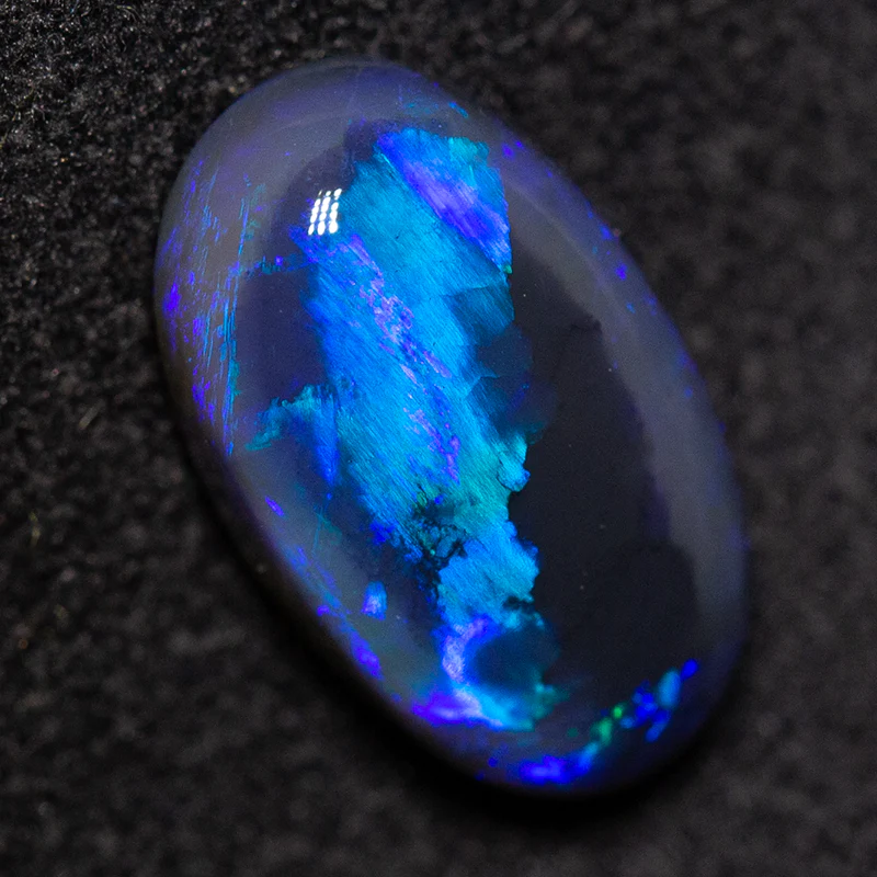 6.01 ct black opal pair 12.5x7.3x5mm - Image 2