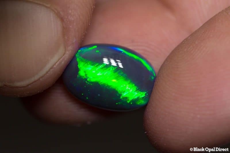 6.30ct cats eye pattern black opal 14.5x10x6.5mm - Image 2