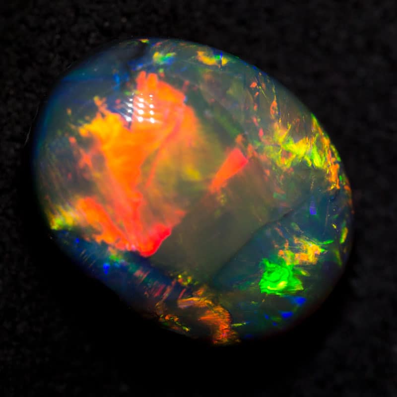 6.44 ct gem black opal 13.4x10.5x7.6mm - Image 2