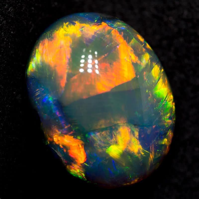 6.44 ct gem black opal 13.4x10.5x7.6mm - Image 4