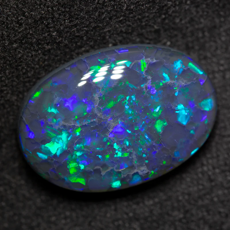 6.88 ct gem black opal 16.4x11.4x5.7mm - Image 2