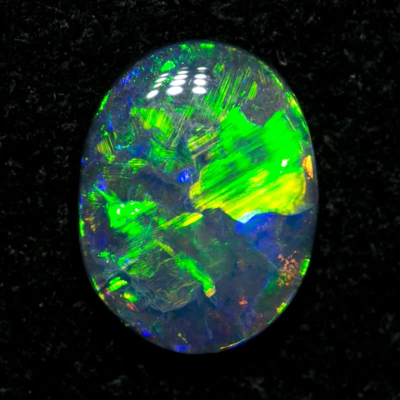 0.67 ct black opal 7.5x6x2mm - Image 3