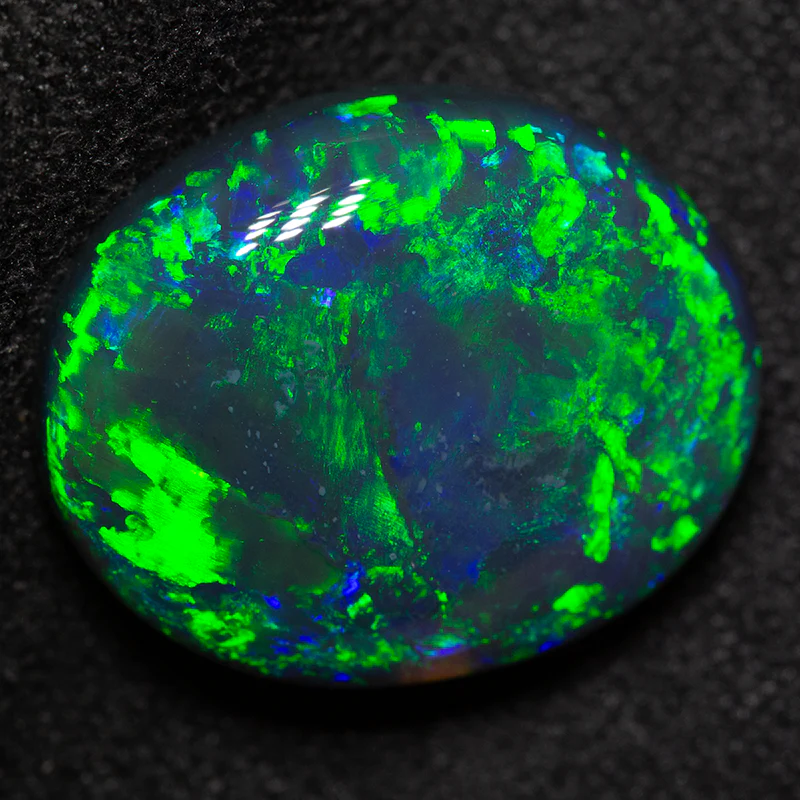 7.35 ct black opal 15.7x12.7x5.6mm - Image 2