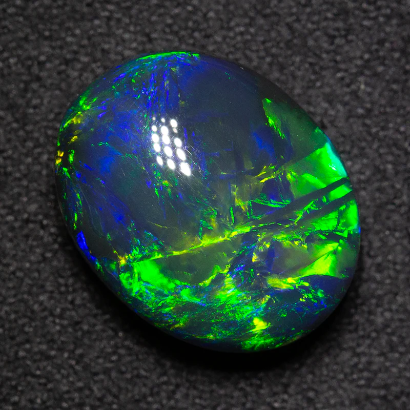 7.55 ct gem black opal 14x11.1x7.4mm - Image 2