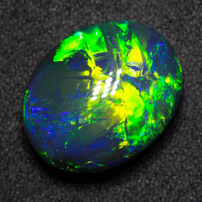 7.55 ct gem black opal 14x11.1x7.4mm - Image 4