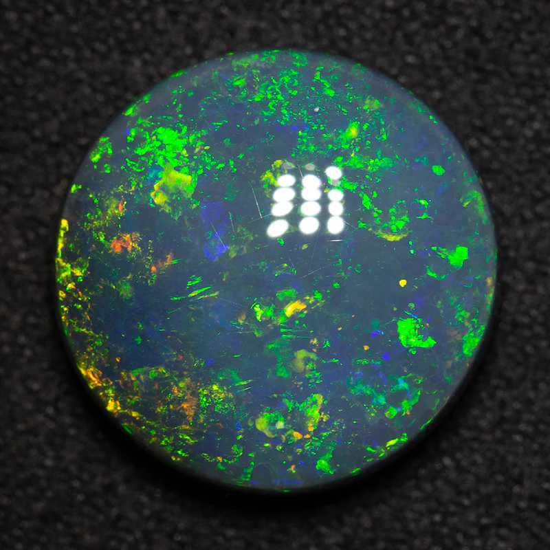 7.60 ct black opal 14x14x5.8mm - Image 2