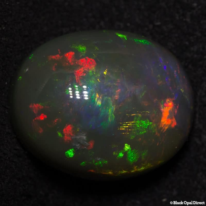7.60 ct semi black opal high domed 14x11x8mm - Image 3