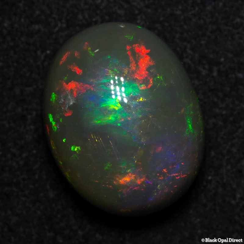 7.60 ct semi black opal high domed 14x11x8mm - Image 5