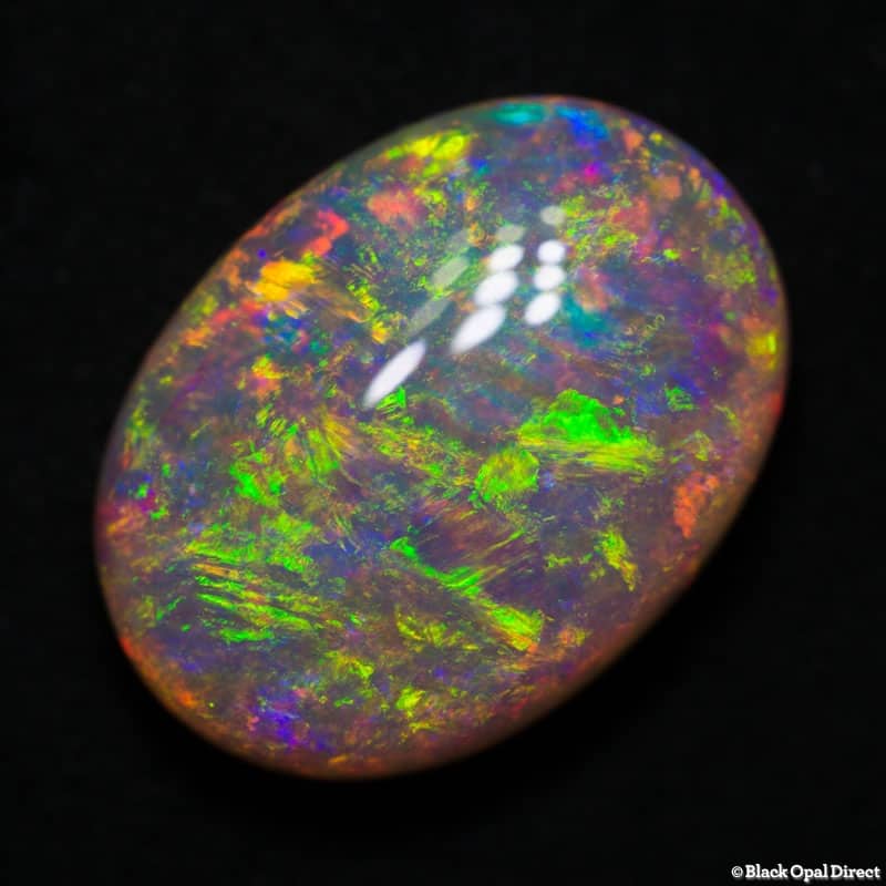 9.48 ct orange green gem crystal opal 17x12.5x7.5mm - Image 3