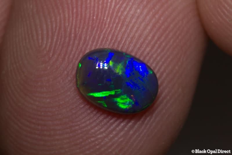 0.84 ct black opal 8x6x3mm - Image 4